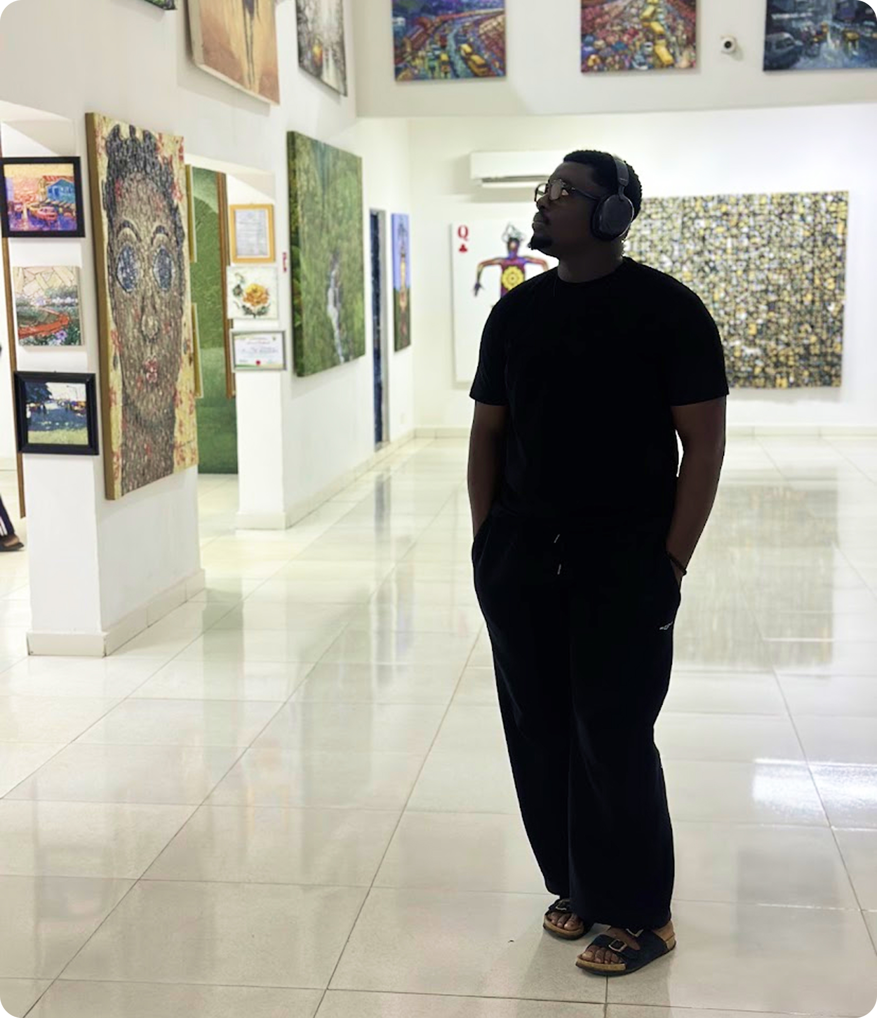 Labi Joshua standing in an art gallery